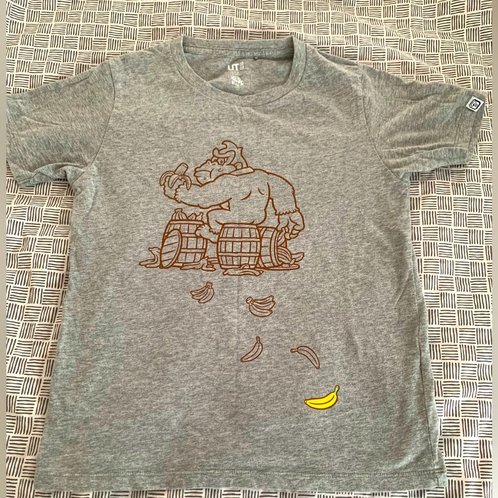 New without tag. Uniqlo kid tshirt